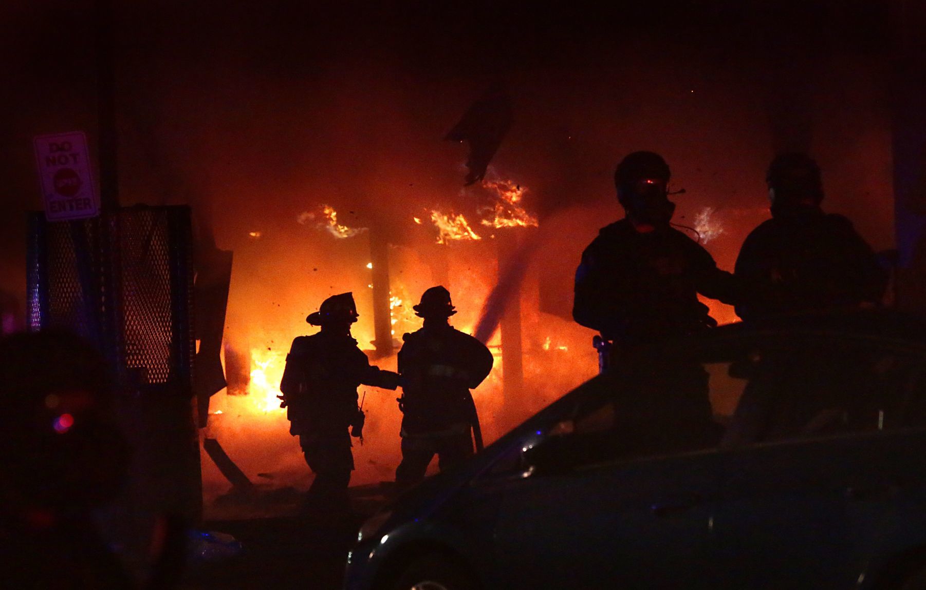 Vandals set fire to downtown 7-Eleven following protest at police station